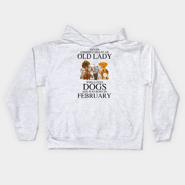 Never Underestimate An Old Lady Who Loves Dogs And Was Born In February Kids Hoodie by louismcfarland